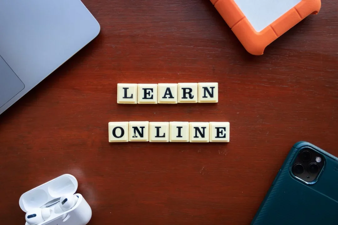Students taking online courses on laptops with certificates displayed on screen